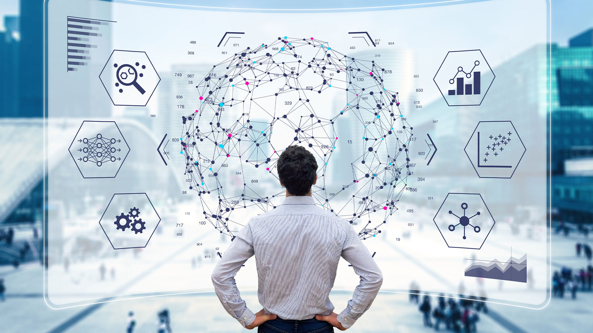 Man standing in front of a large, futuristic digital interface displaying interconnected nodes and hexagonal icons representing various technologies such as data analysis, machine learning, and automation, symbolizing data-driven decision-making and innovation