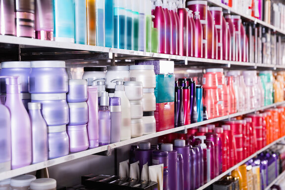 shelf at supermarket with drugstore products