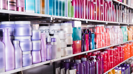 shelf at supermarket with drugstore products